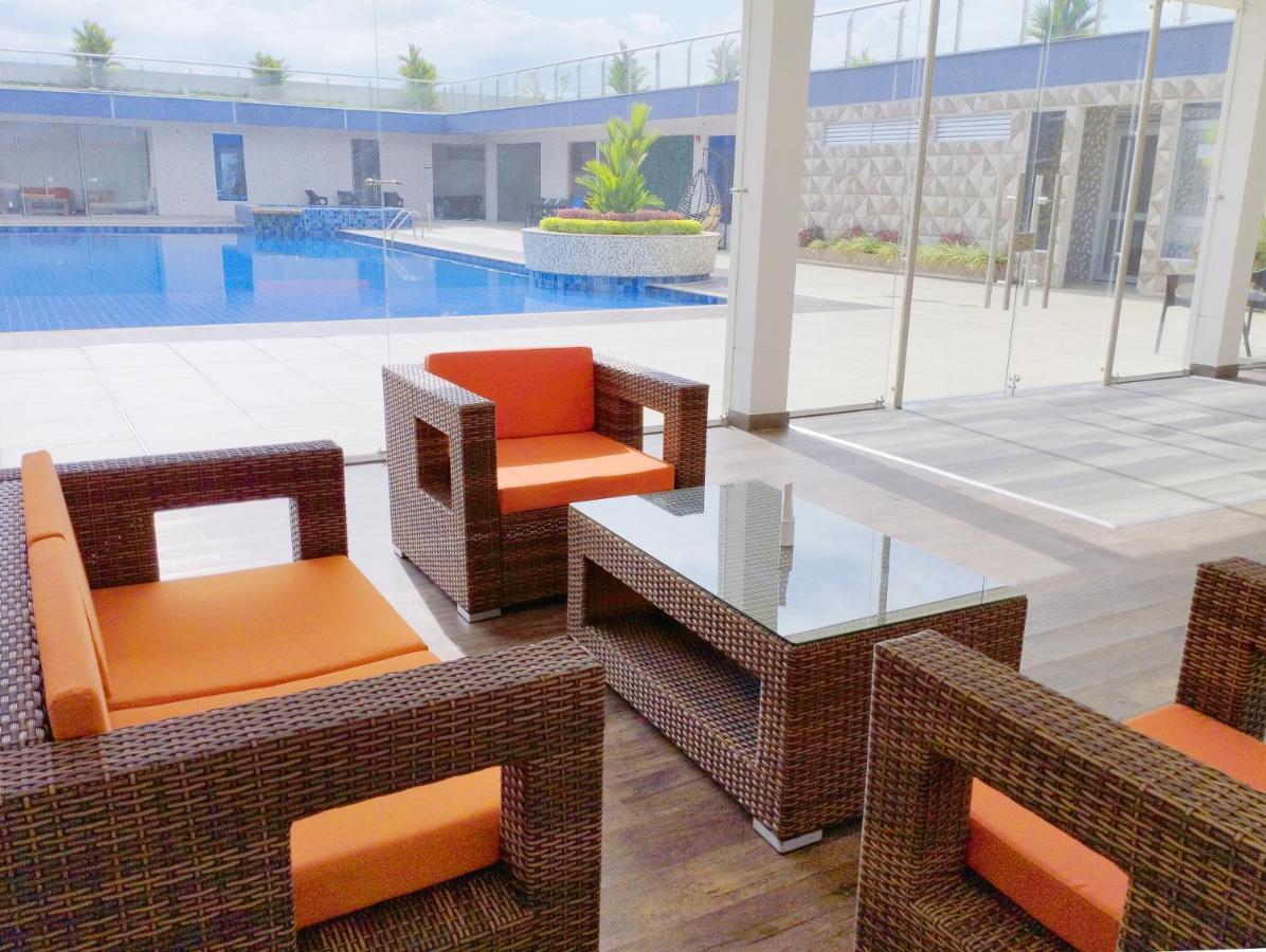 Hotel Royal Elim International San Antonio  Exterior photo WOVEN PE rattan