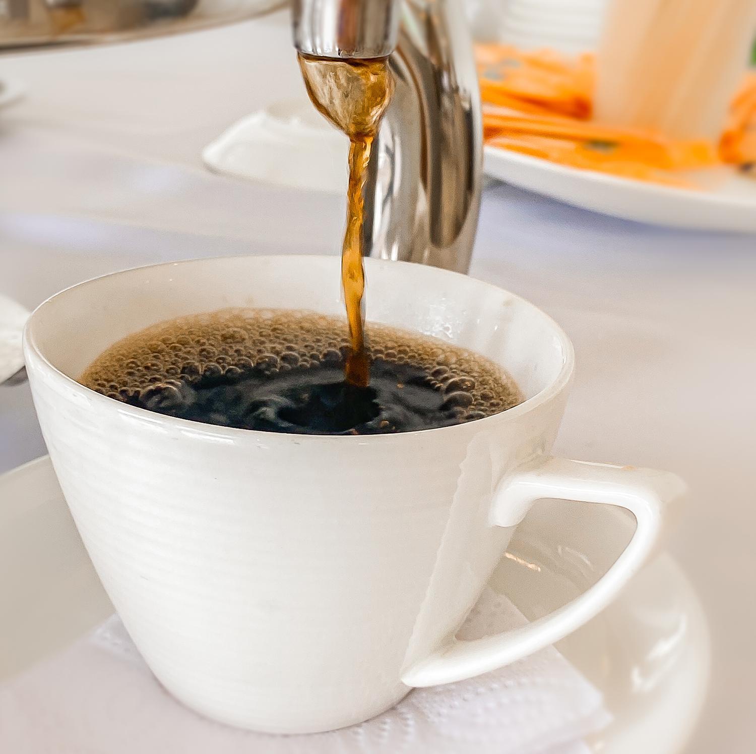 Hotel Royal Elim International San Antonio  Exterior photo Coffee being poured