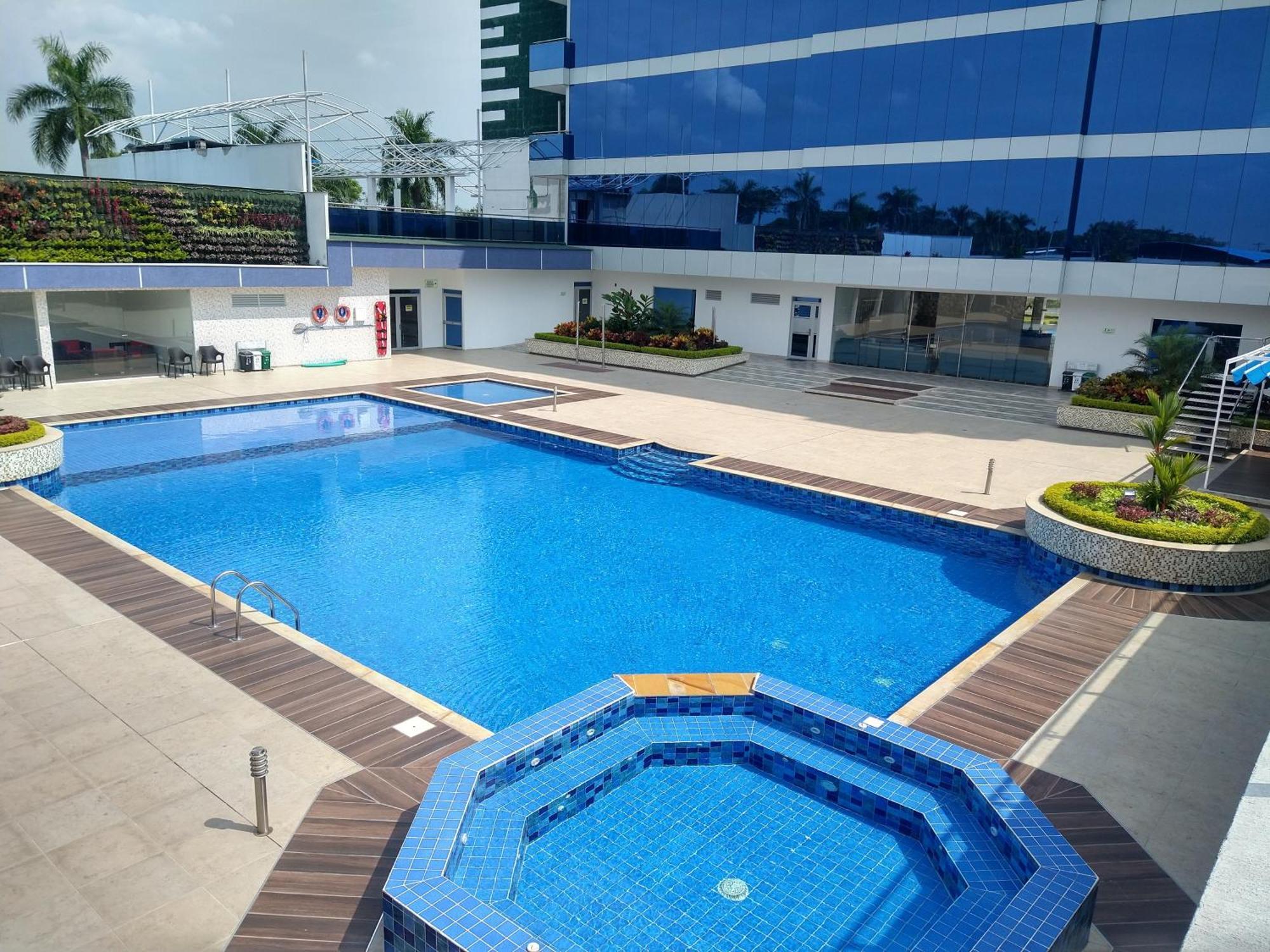 Hotel Royal Elim International San Antonio  Exterior photo Swimming pool at the hotel