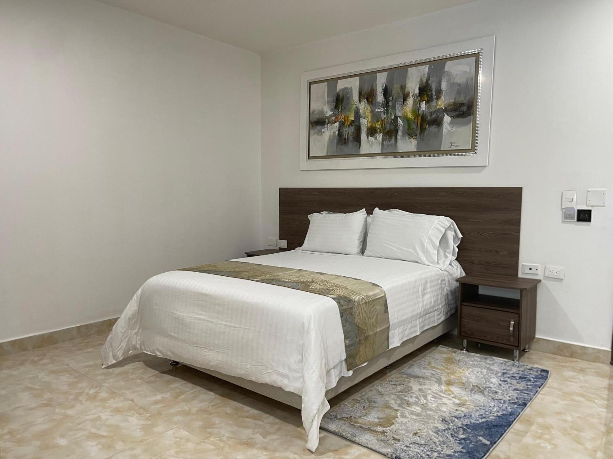 Hotel Royal Elim International San Antonio  Exterior photo A bedroom in the hotel